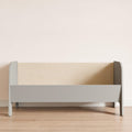 Big wooden toy chest with open structure with sides and front in gray.