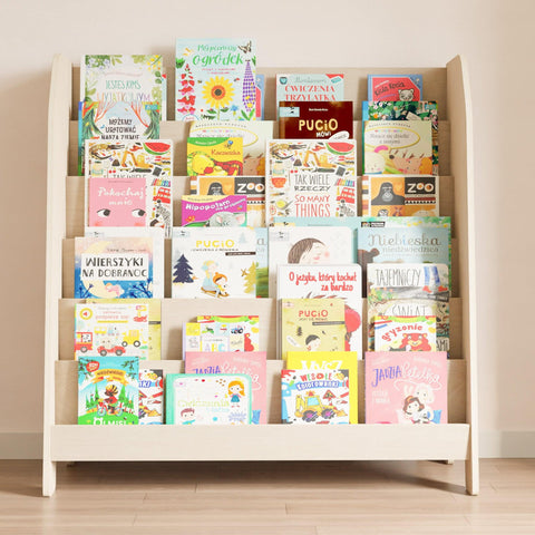 Large wooden six-shelf montessori bookcase with books facing forward with the cover.