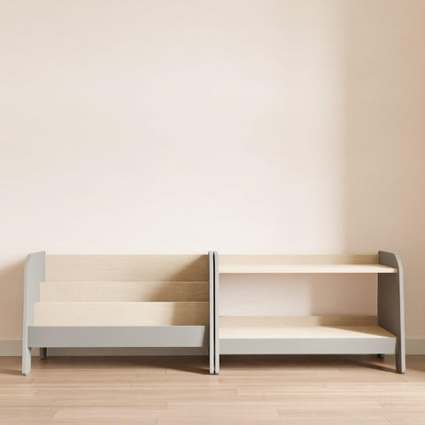 A set of low grey montessori furniture for storing books and toys.