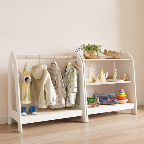 A Montessori coat rack for dress storage and a front-facing bookcase with three wooden shelves for toy storage. 