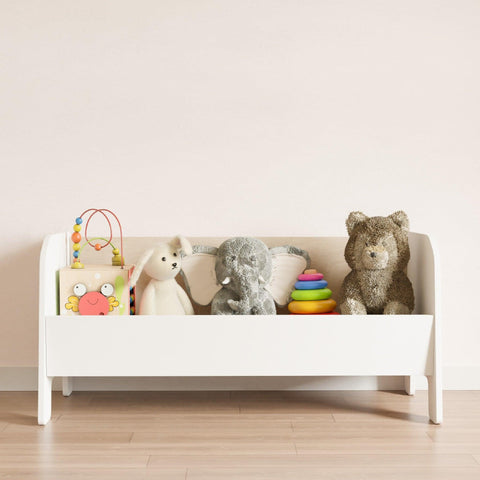 White nursery toy chest with open structure in montessori style.