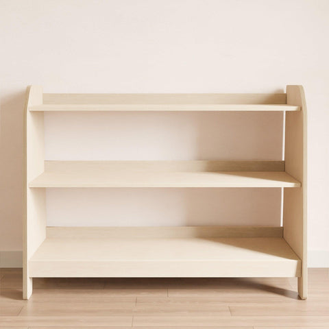 Wooden furniture for children with three shelves for storing toys.
