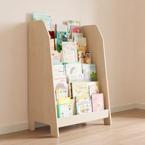 A wooden modern Montessori bookcase with books displayed with the cover facing forward.