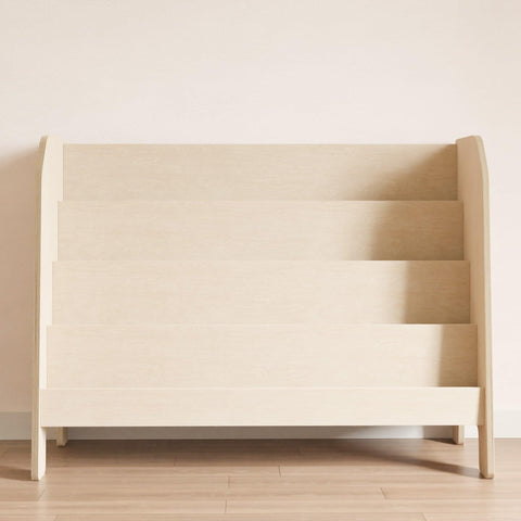 Four-shelf montessori style bookcase made of wood.