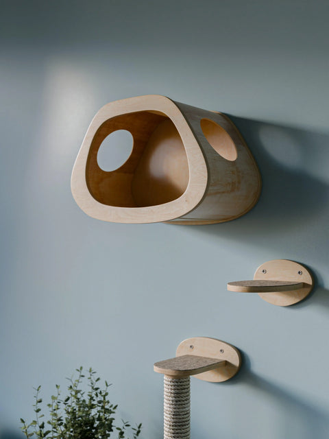 Modern wall-mounted cat furniture set featuring a wooden house, climbing steps, and a scratching post.