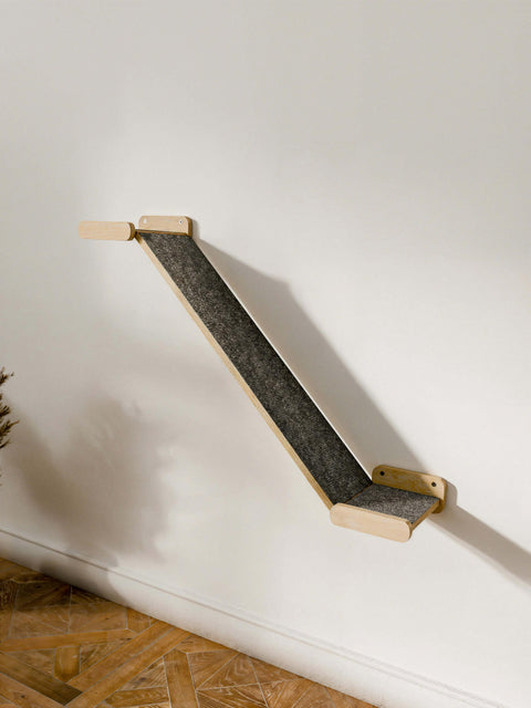 Natural wood Minimalist Cat Bridge viewed from the side. A sturdy Wall-Mounted Cat Climber that blends seamlessly with bright home decor.